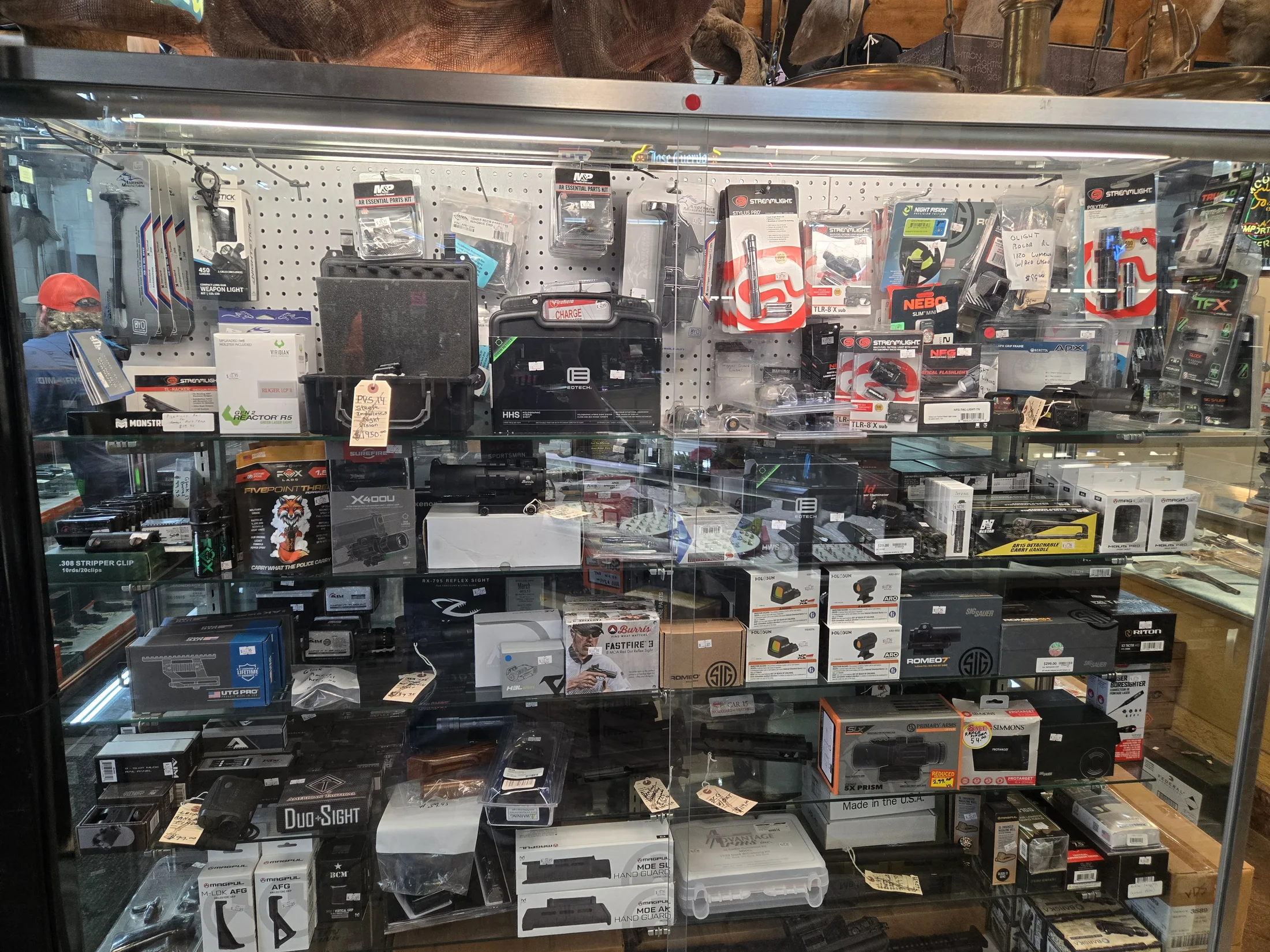 Showcase of optics, lights and shooting accessories at AAA Gun & Pawn